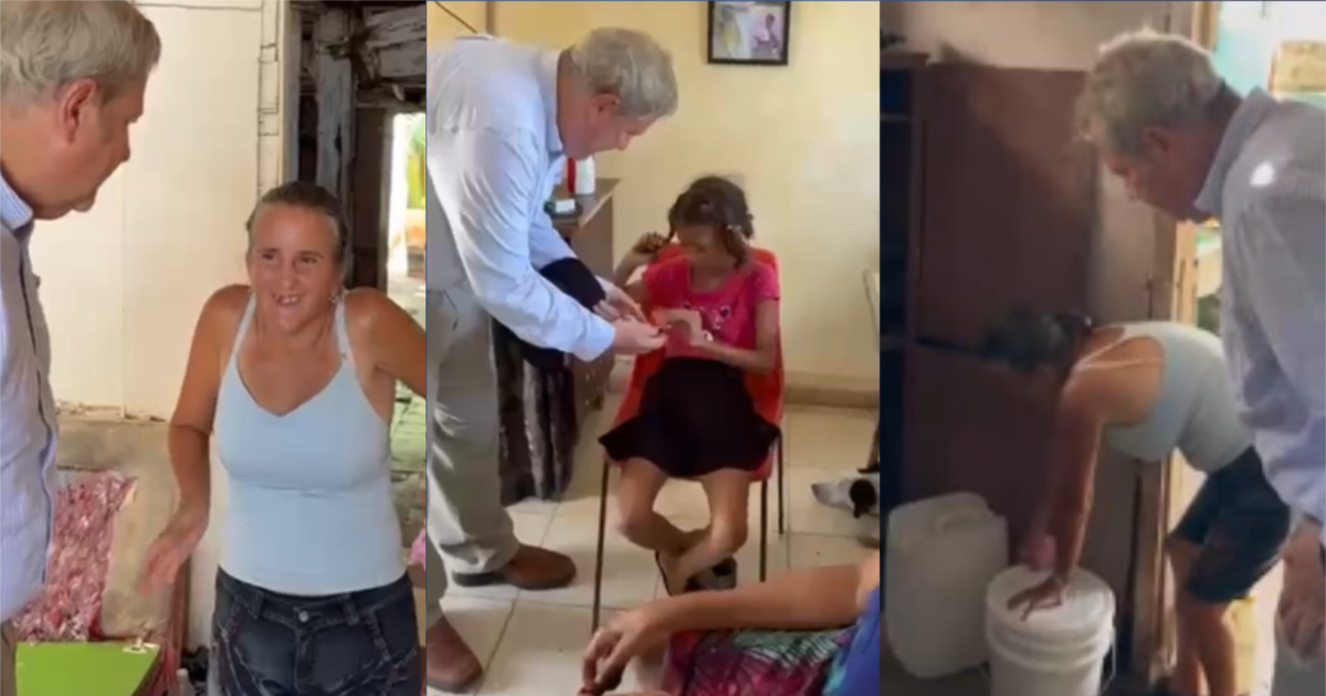 Mike Hammer visitando familias en Bejucal que recibieron ayuda humanitaria de EEUU.